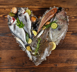 Many kind of seafood in heart shape. Served on crushed ice