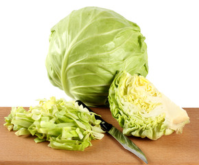 Cut green cabbage isolated on white background