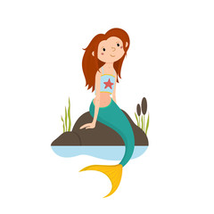 Obraz na płótnie Canvas Little red haired mermaid sitting on rocks, looking up, cartoon vector illustration isolated on white background. Cartoon cute little mermaid girl sitting on rocks