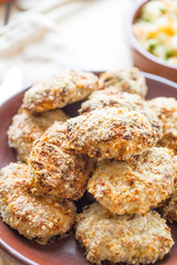 Homemade Chicken Cutlets with Parsley, Plate full of Delicious Chicken Cutlets prepared for eat, Vertical View