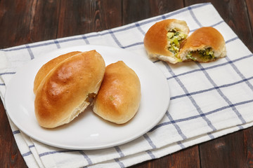 Homemade baked patties or pies with ramson, wild garlic