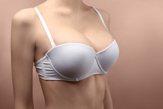 Woman's breast, closeup. Plastic correction and surgery concept