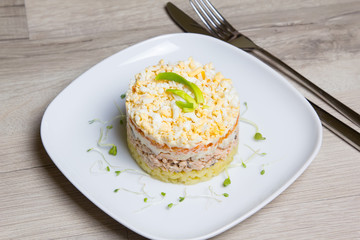 Traditional Russian salad Mimosa