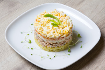 Traditional Russian salad Mimosa