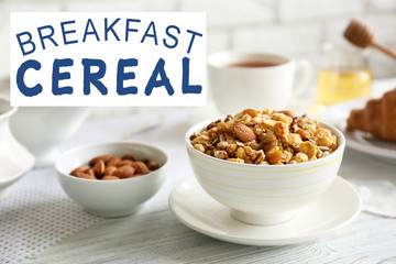 Text BREAKFAST CEREAL. Bowl of muesli on wooden table