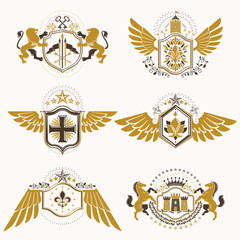 Obraz premium Vintage heraldry design templates, vector emblems created with bird wings, crowns, stars, armory and animal illustrations. Collection of vintage style symbols.