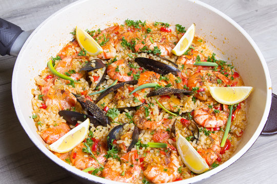 Paella with shrimps and mussels. Traditional Spanish dish