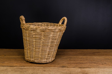 wicker basket on wooden table - 152420405