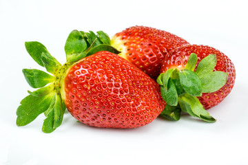 Ripe strawberry on white background.