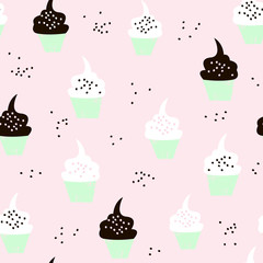 Seamless pattern with mint cupcakes and hand drawn elements. Great for fabric and textile. Vector Illustration