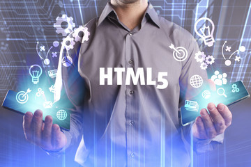 Business, Technology, Internet and network concept. Young businessman working on a virtual screen of the future and sees the inscription: HTML5