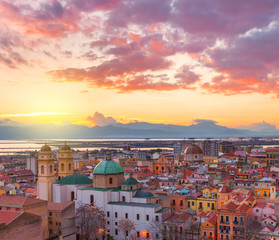 Cagliari skyline during the sunset, evening panorama of Sardinia capital, Italy - obrazy, fototapety, plakaty