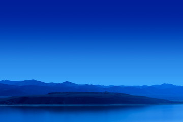 Blue Night Lake with Mountains Background