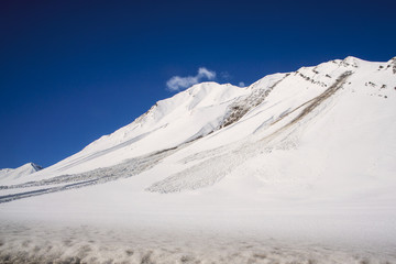 avalanche near the road in the Caucasian mountains