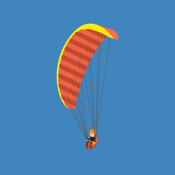 Man paragliding on a parachute. Parachutist descending with a parachute.