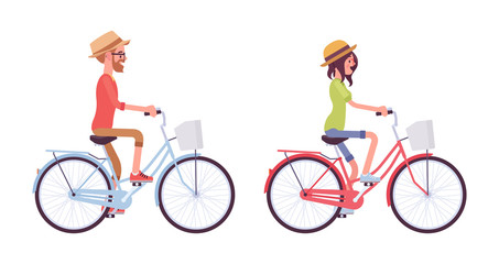 Young man and woman riding a bike