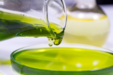 Flask for chemical experiments with green liquid