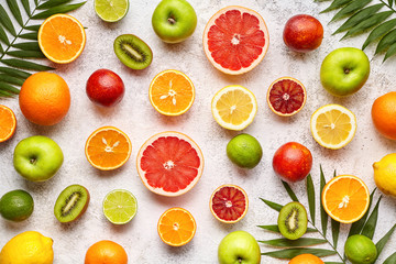 Citrus fruits background mix flat lay, summer healthy vegetarian food, antioxidant detox nutrition diet