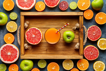 Smoothie or fresh juice in wooden tray, healthy lifestyle vegan organic antioxidant detox diet.