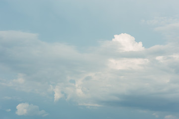 Cumulus clouds in a clear blue sky. Aerial clouds.
