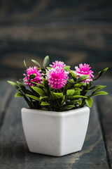Artificial Flowers in White Flowerpots
