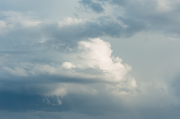 Fototapeta na wymiar Rain Cumulus clouds in a clear blue sky. Aerial clouds.