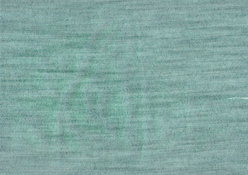Green jeans cloth texture.