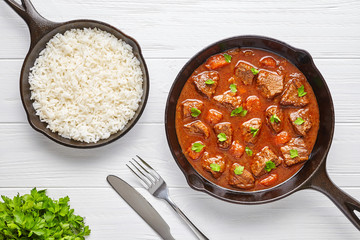 Goulash traditional Hungarian beef meat stew soup food dinner cooked recipe with spicy gravy sauce...