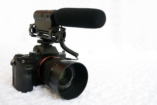 Professional mirrorless digital video camera with shotgun microphone