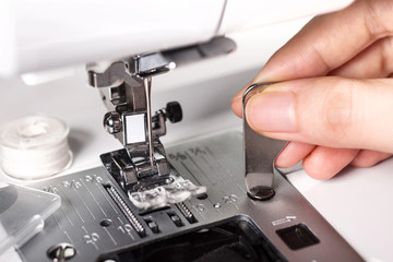 close up of repair the sewing machine