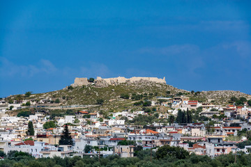 Cityscape of Archangelos with the castle in the bacground, Rhodes island, Greece