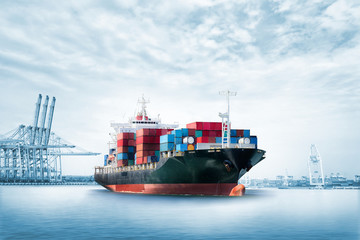 Logistics import export background of Container Cargo ship in seaport on blue sky, Freight Transportation