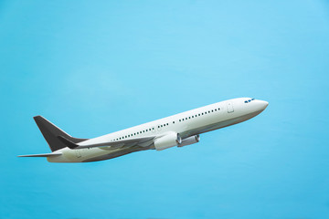 white airplane on a blue background