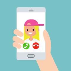 Hand holding a smart phone. Incoming call from funny teenage millennial girl/ flat vector illustration
