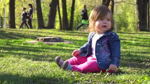 Little baby girl in the park