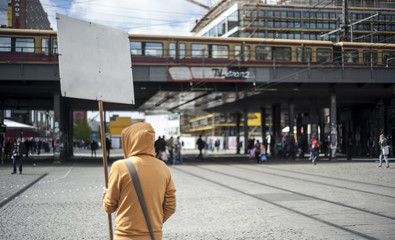Man with empty placard