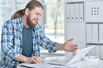 Fototapeta premium Businessman at the desk working 