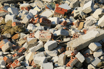 Pile of broken concrete blocks. Construction debris.