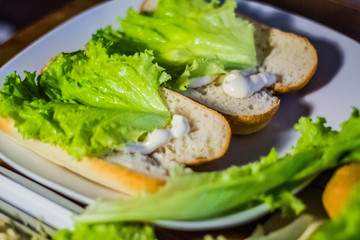 cooking sandwich with salad and mayonnaise