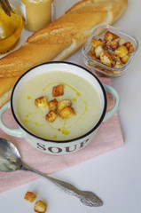 Bowl of vegetable soup. Cauliflower soup puree with croutons.