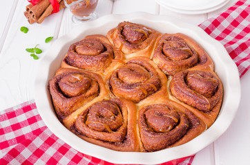 Cinnabon. Yeast buns with cinnamon and caramel sauce.