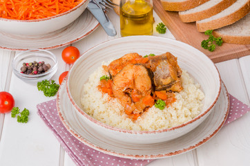 Fish stewed in tomato sauce with vegetables