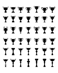 Black silhouettes of trophy cup on a black background