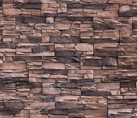 Structure of a wall of solid stone blocks, a fortification wall, a stone castle