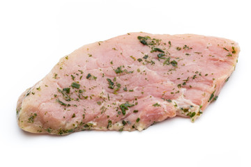 Steak with spices isolated on white background.