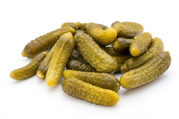 Marinated pickled cucumbers isolated on the white.