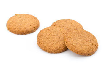Stacked short pastry cookies isolated on white background.