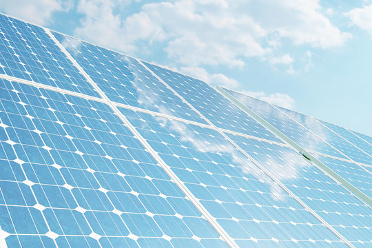 3D illustration solar panels on sky background. Alternative clean energy of the sun. Power, ecology, technology, electricity.