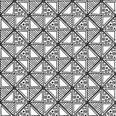 Seamless vector pattern. Black and white geometrical background with hand drawn decorative tribal elements. Print with ethnic, folk, traditional motifs. Graphic vector illustration.
