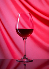 Wine. Glass of wine on gray background